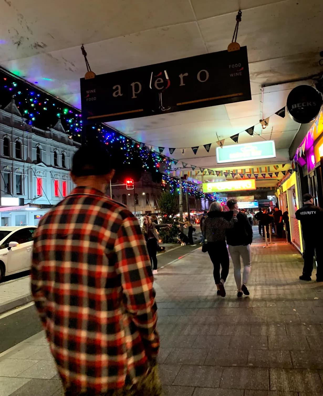 People on K Road at night